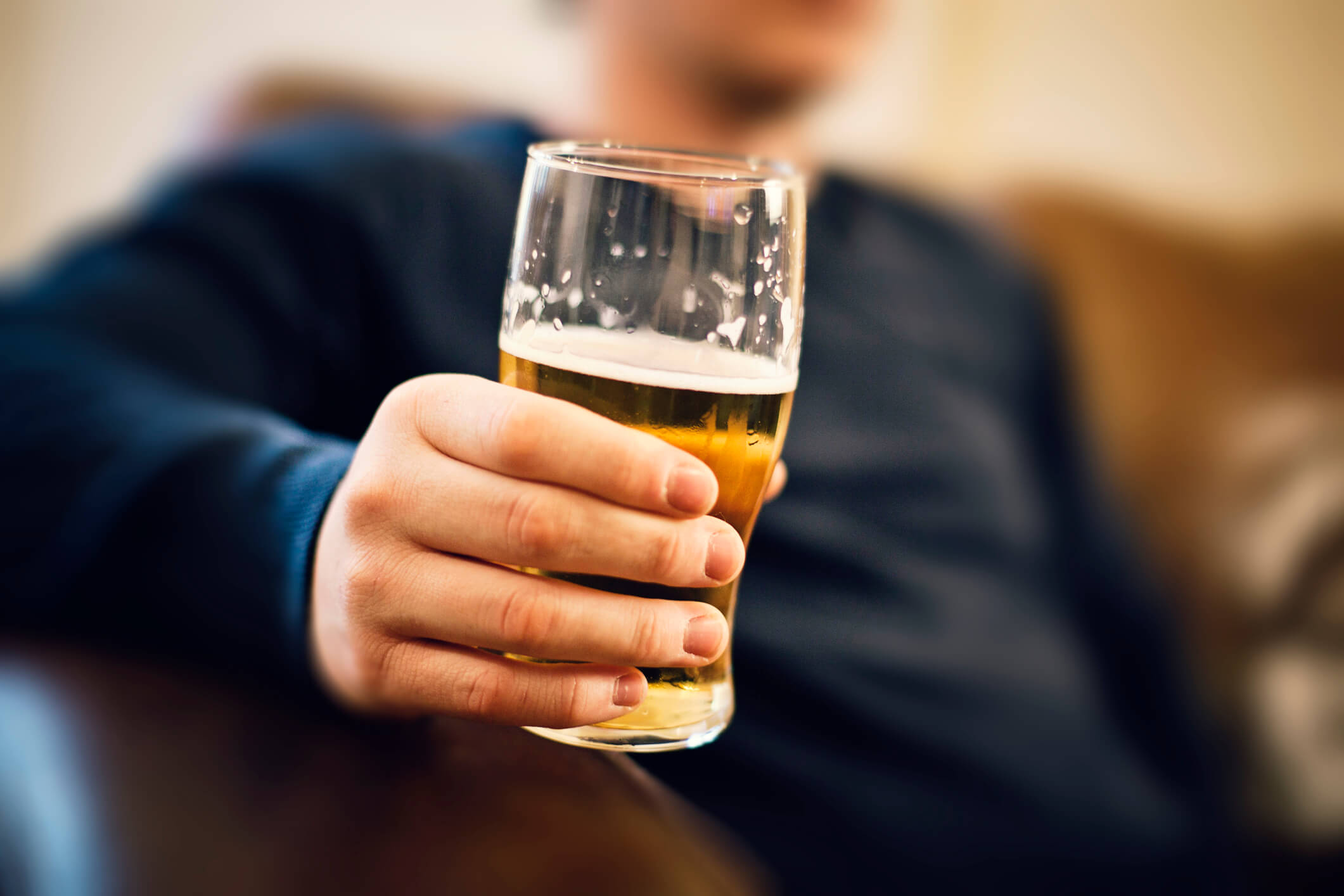 man drinking beer